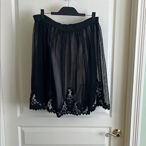 Burning Torch Black Sheer Skirt with Floral Embroidery elastic is loose